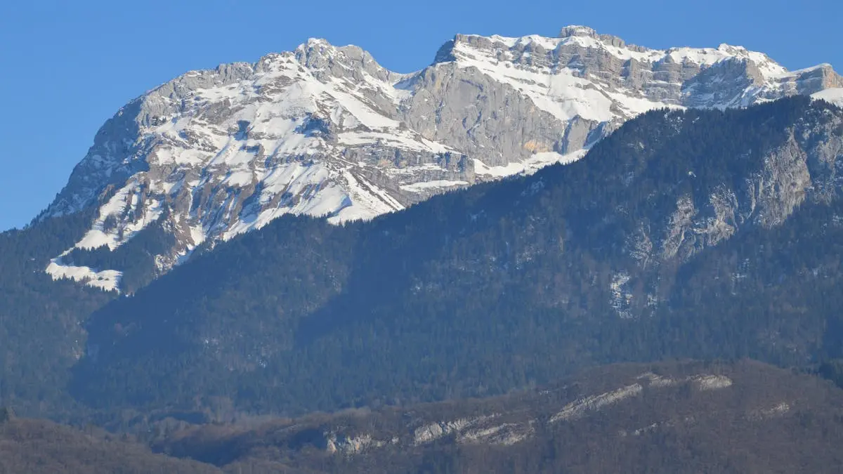 Majestic view of Tournette Mountain, snowcapped and scenic in Haute-Savoie, France.