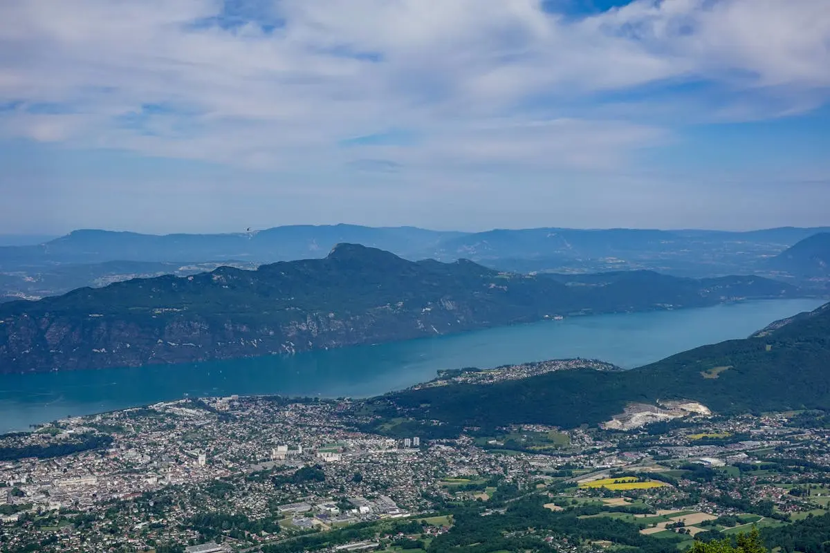 Stunning aerial photography capturing Mont Revard, lake and town in Savoie, France.