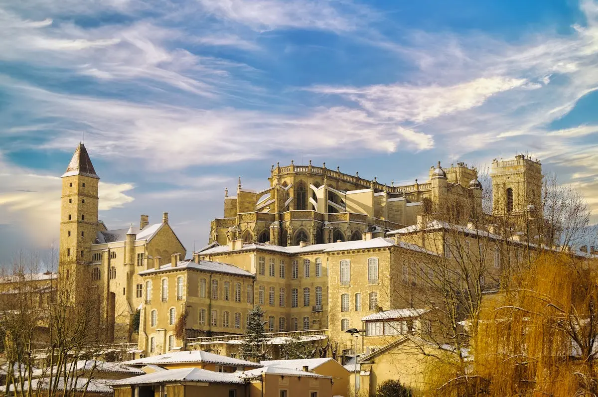 Explore the stunning winter view of Auch Cathedral in France, showcasing Gothic architecture.