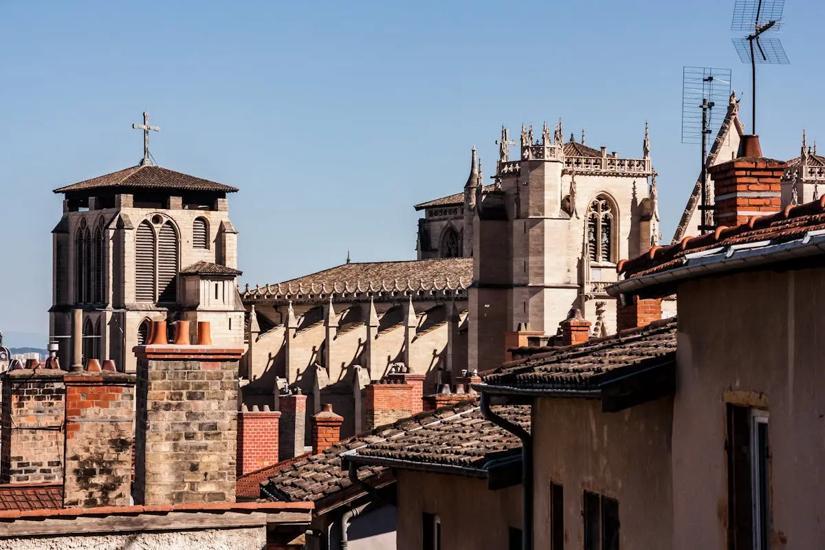 A stunning view of historic cathedrals and rooftops in Lyon, France.