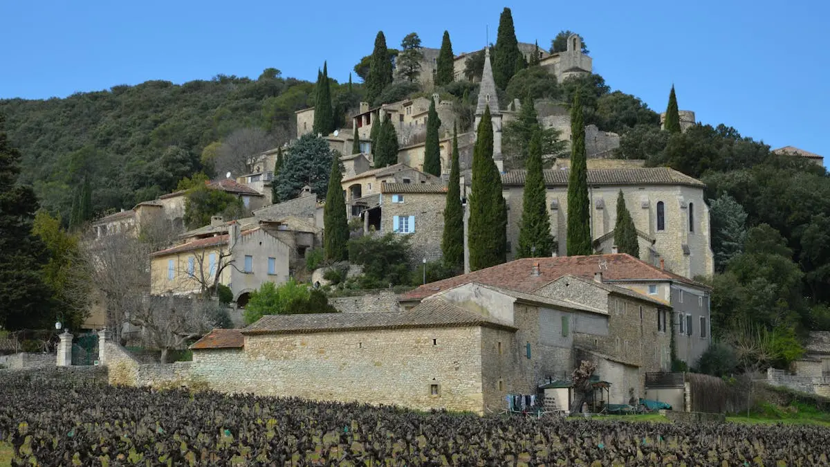 Charming medieval village nestled among hills in La Roque-sur-Cèze, France.