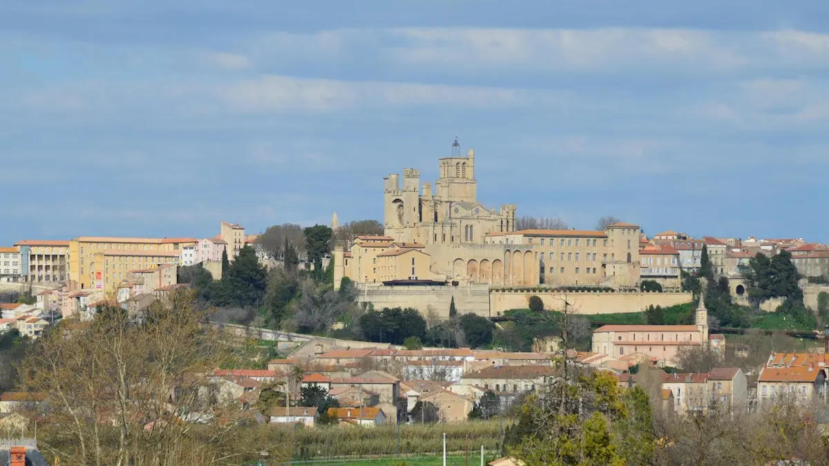 Stunning view of Béziers Cathedral overlooking the town in Occitanie, France.