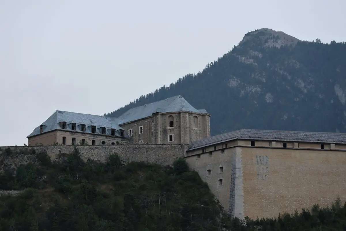 Capture of ancient fortifications in Briançon against a mountainous backdrop.