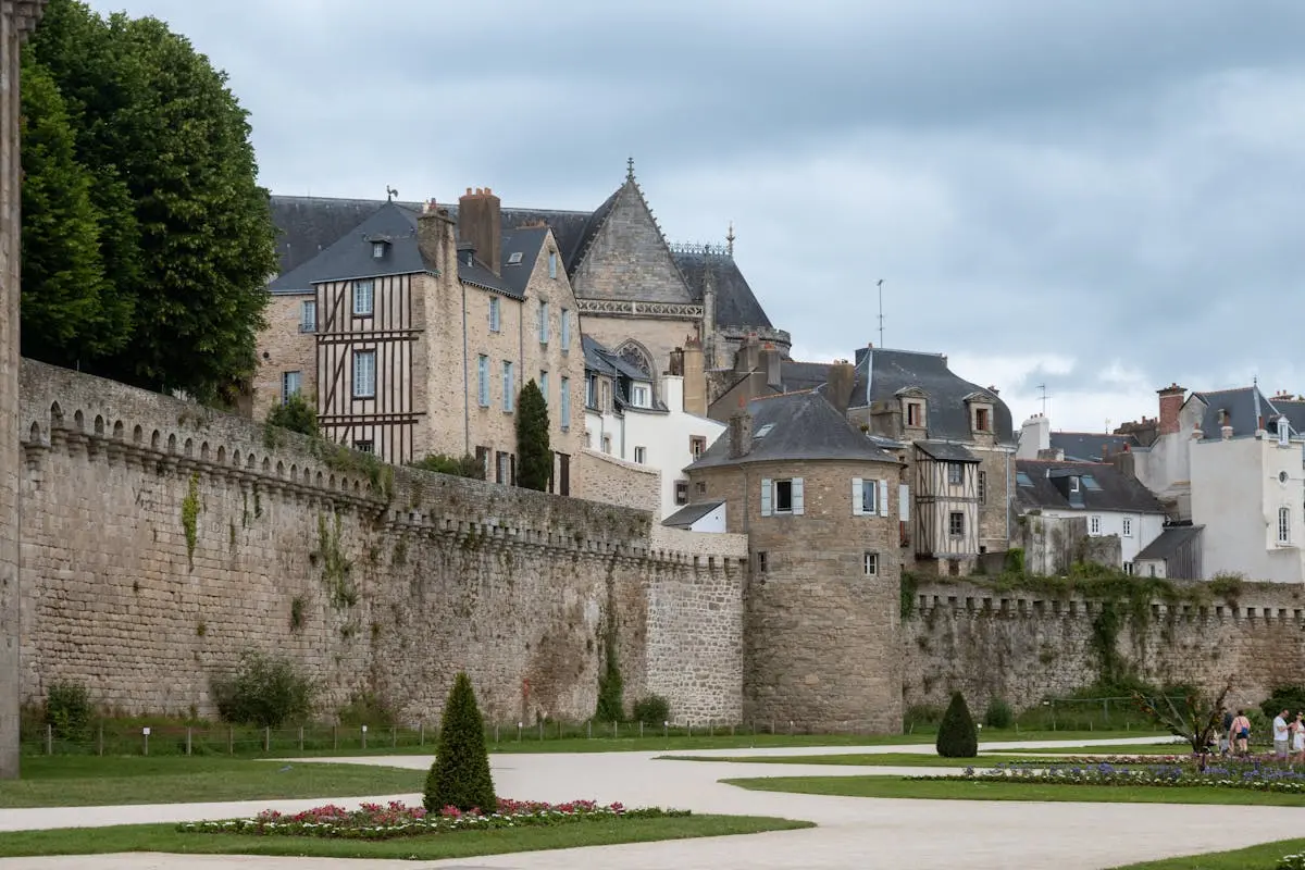 Ancient city walls and architecture in Vannes, Brittany, France on a cloudy day.