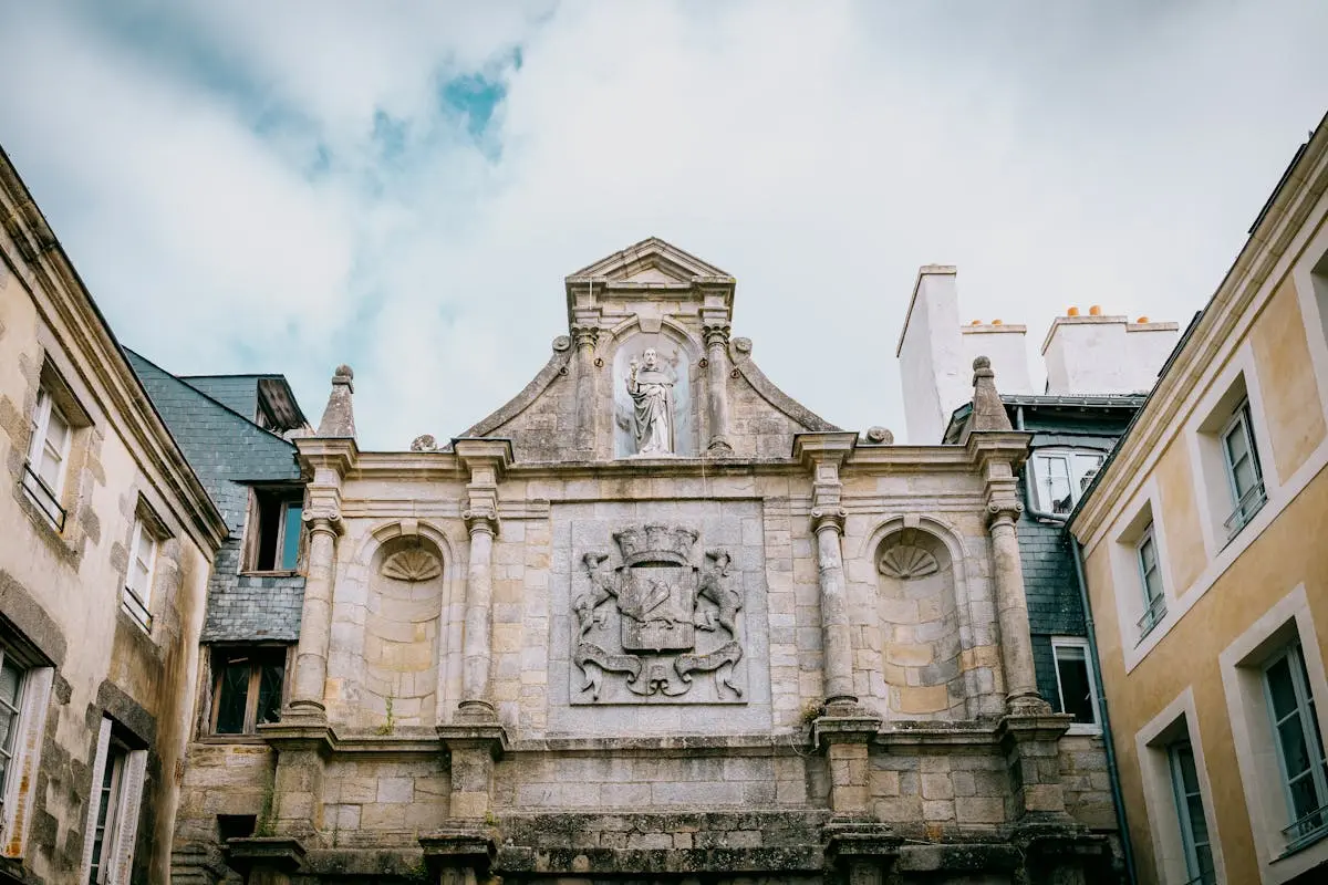 Stunning medieval stone building facade in Vannes, showcasing rich historic architecture.